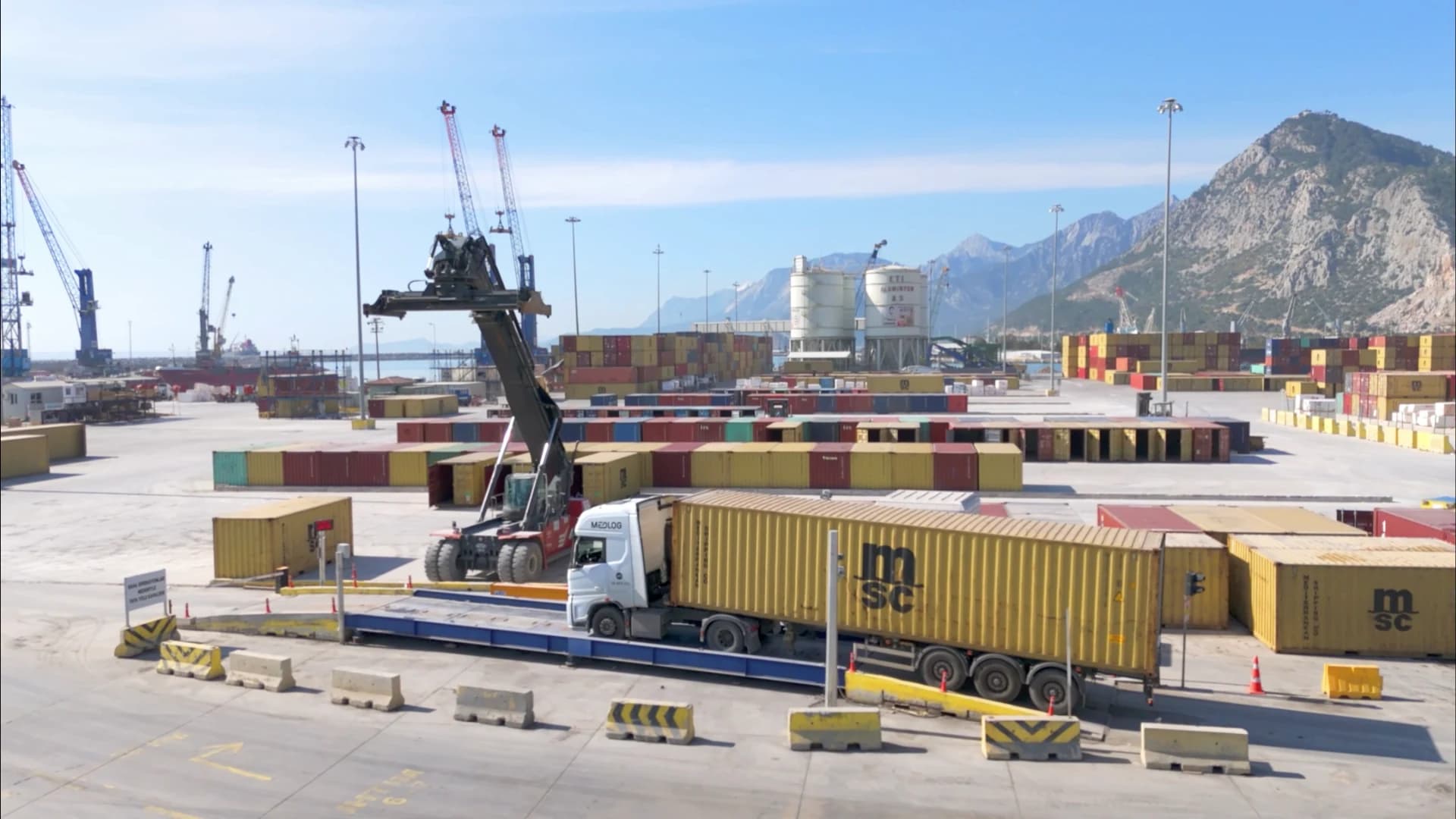 Container truck on the weighbridge within the QTerminals Antalya terminal yard