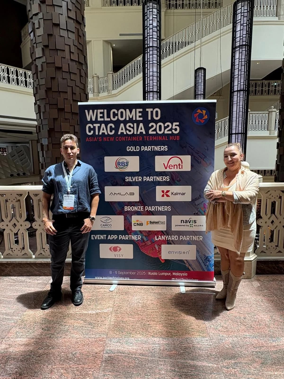 SOLONPORT representatives at the CTAC Asia 2025 event sign